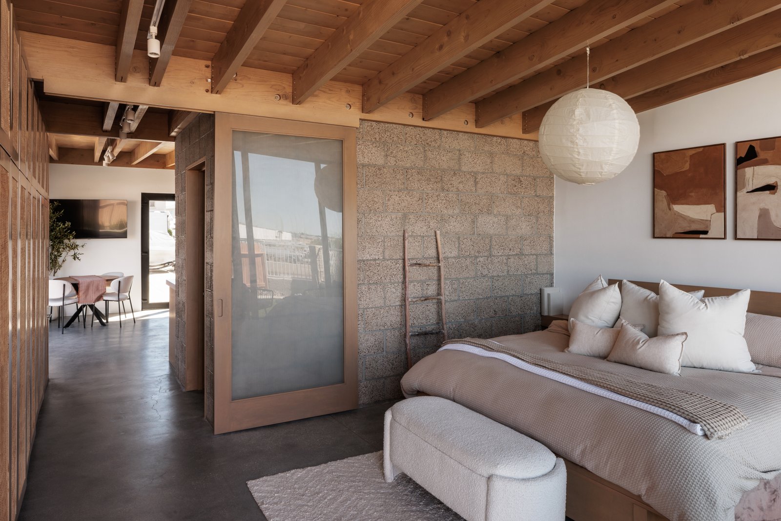 ADU Completed - Bedroom showing cinder block partition wall